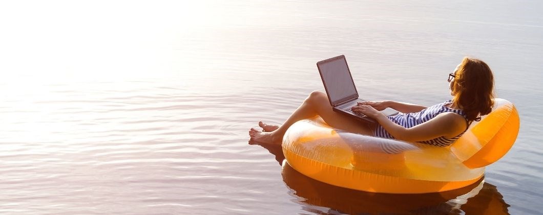 Insurance expert working remotely on an inflatable ring